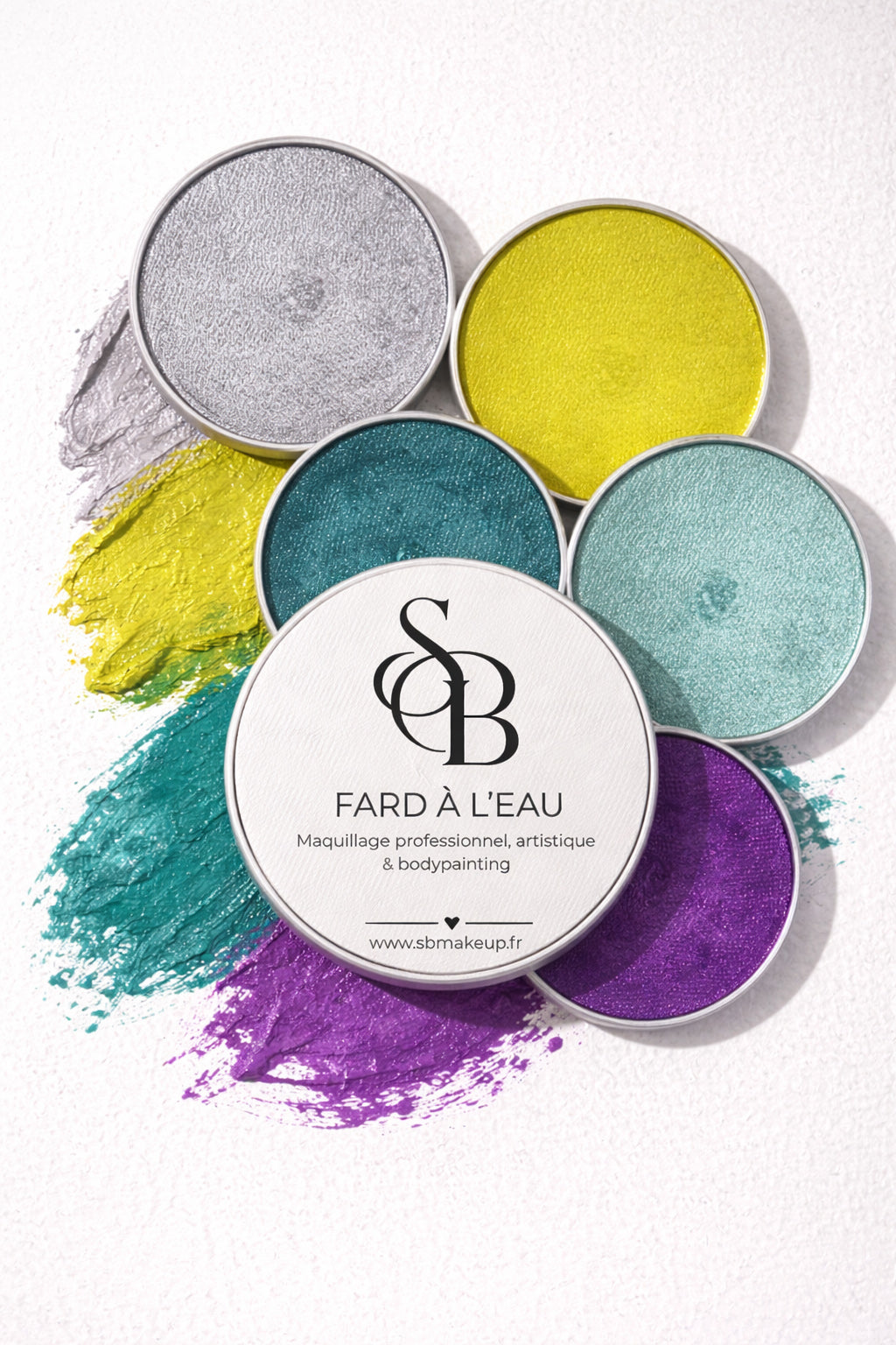 Fards à l’eau SB Make-Up pour maquillage artistique et bodypainting, palette de couleurs professionnelles jaune, turquoise, vert, violet et argent avec logo SB
